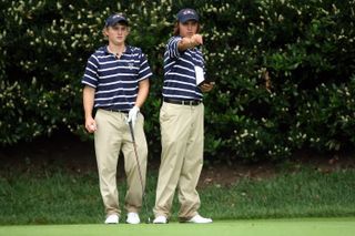 Bud Cauley of the USA (left) with his playing partner Rickie Fowler on the 11th tee during the morning foursome matches on the East Course at Merion Golf Club on September 12, 2009