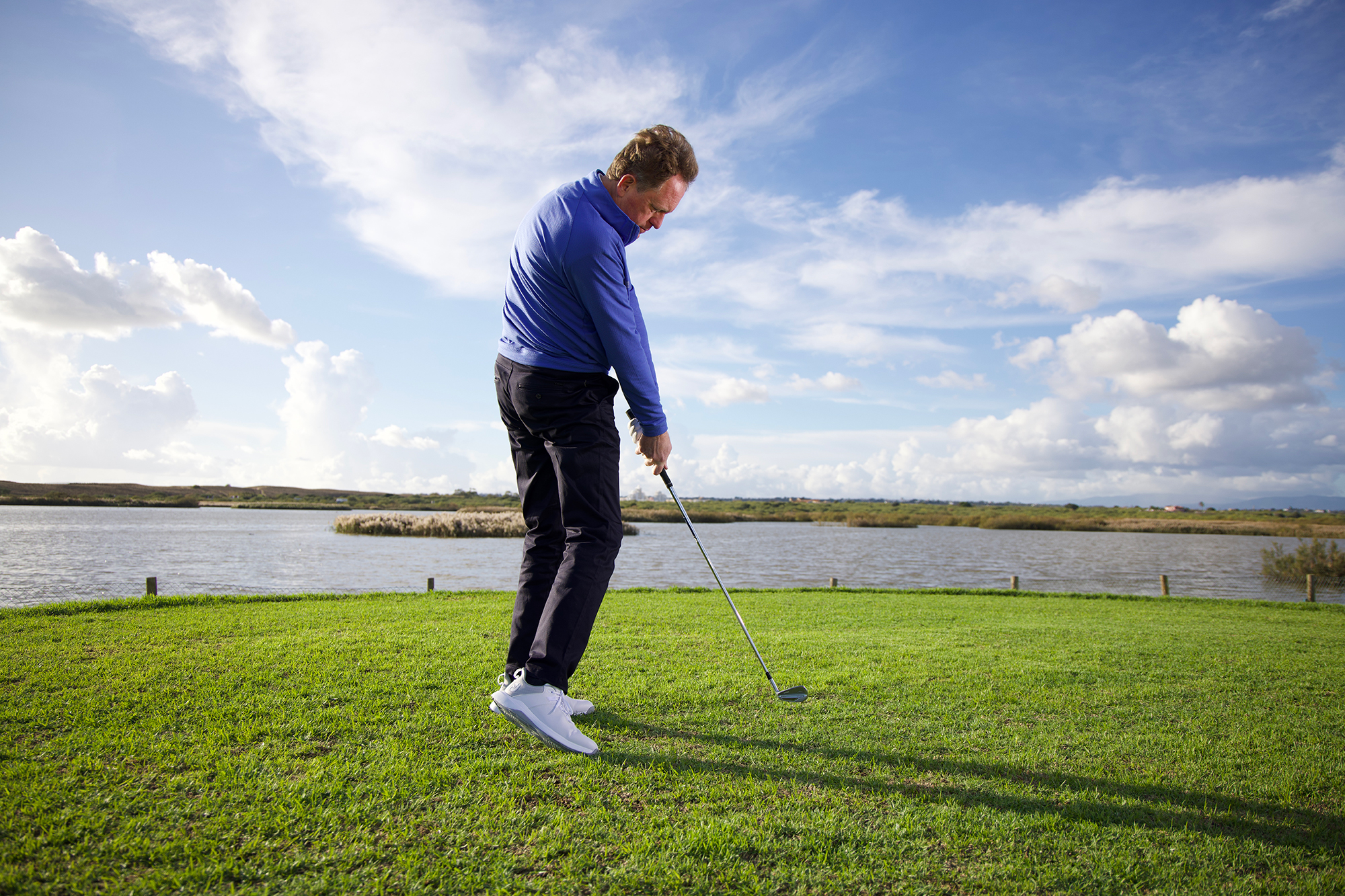 Keith Wood demonstrating poor posture at impact, with the hands too high and the feet not creating a stable base that generates efficient power