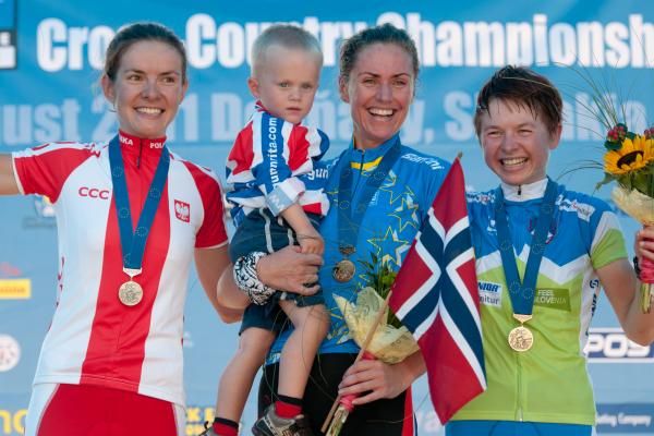 Gunn-Rita Dahle Flesj&aring; topped the podium with her son Bjornar at the European Championships