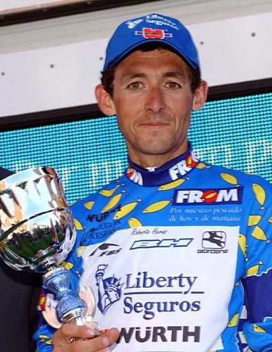 Roberto Heras (Liberty Seguros) smiles from the podium in the points jersey