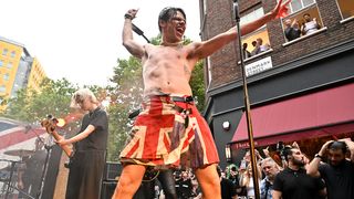 LONDON, ENGLAND - AUGUST 7: Yungblud performs a live set on Denmark Street during the launch of his new store 'Beautifully Romanticised Accidently Traumatized' at 20 Denmark Street on August 7, 2025 in London, England. (Photo by Nicky J. Sims/Getty Images)