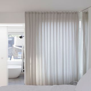 bedroom white sheets double bed window curtain