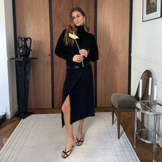 Adenorah in a skirt and high neck jumper