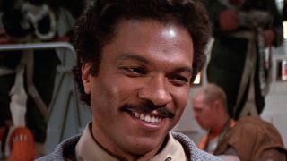 Billy Dee Williams as a smiling Lando Calrissian in Star Wars: The Empire Strikes Back
