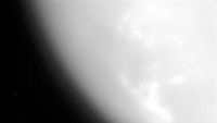 Cassini's imaging science subsystem captured the first close-up images of Saturn's hazy moon Titan on Oct. 26, 2004, as the probe was flying 745 miles (1,200 kilometers) above the moon.