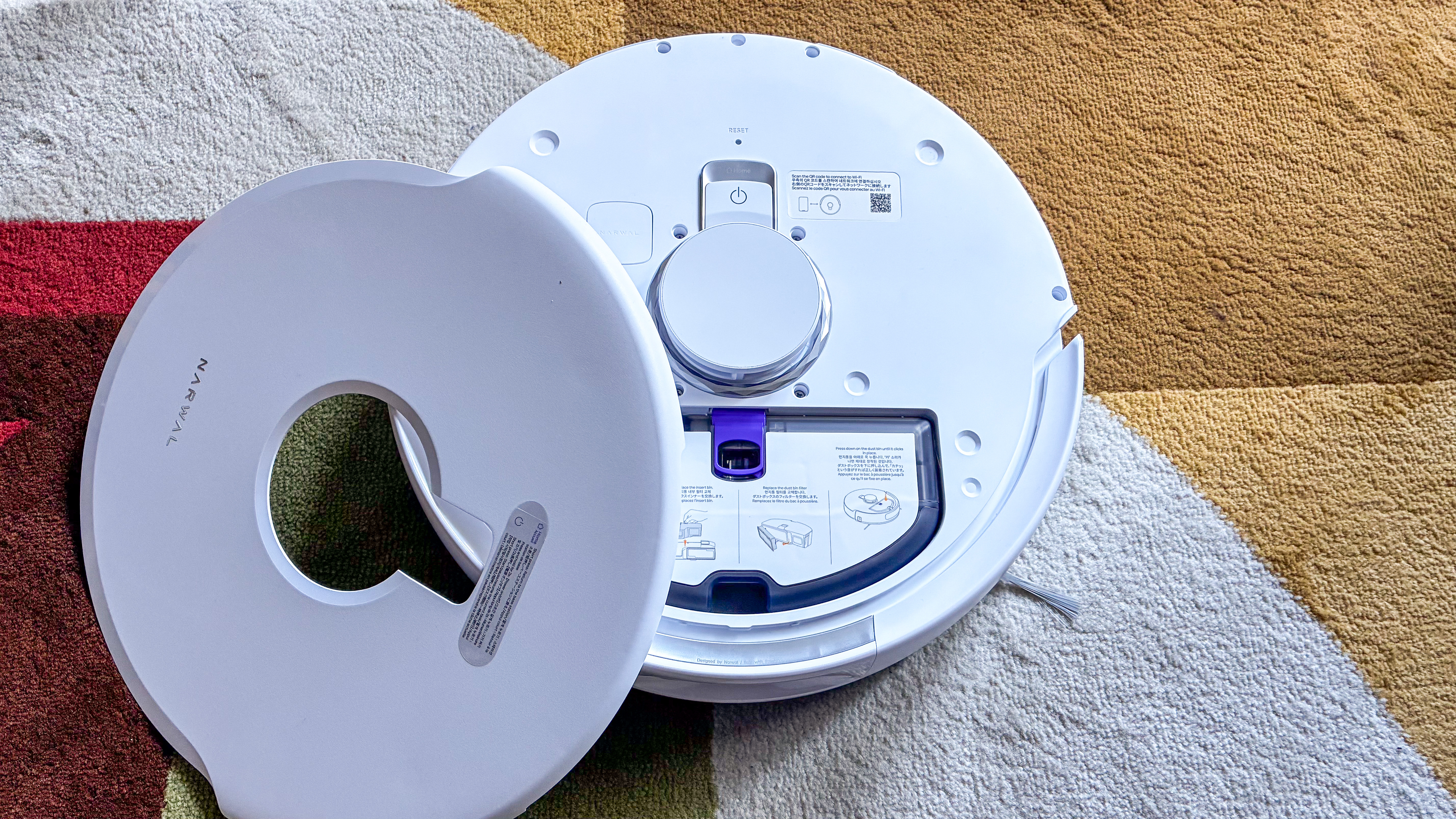 The cover lying beside the Narwal Freo Z10 robot