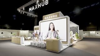 MAXHUB's trade show stand with huge displays in mock conference rooms showing videoconferencing solutions. 