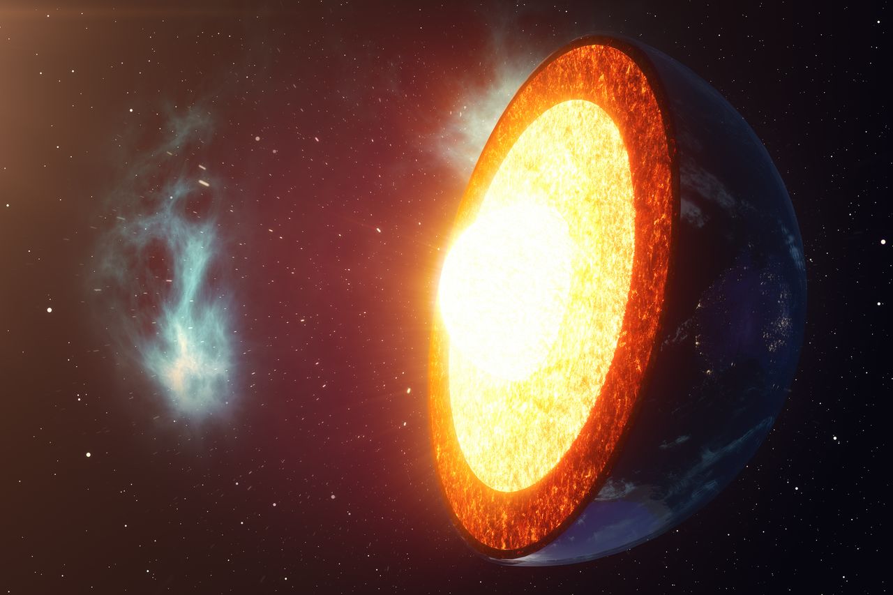 Illustration of the Earth cut in half, so the inner core is visible.