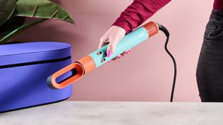 Dyson Airwrap i.d. with dryer attachment on it