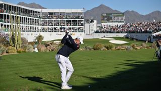 Matt Fitzpatrick takes a shot on the 16th whole during the 2024 Waste Management Phoenix Open