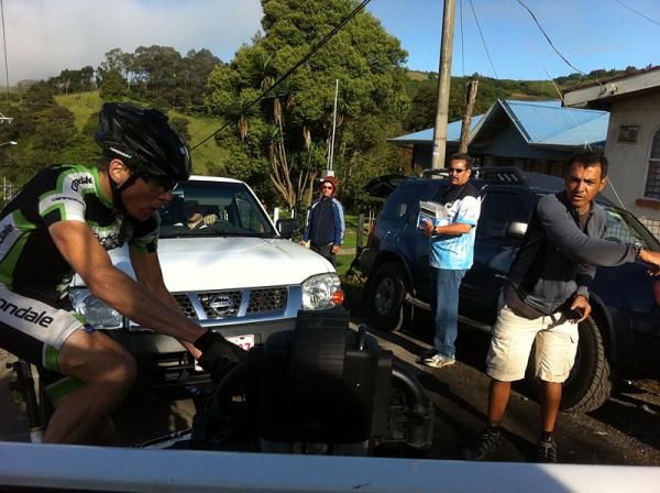 Alex Grant (Cannondale) weaves his way through La Ruta traffic. Helpful onlookers direct him.
