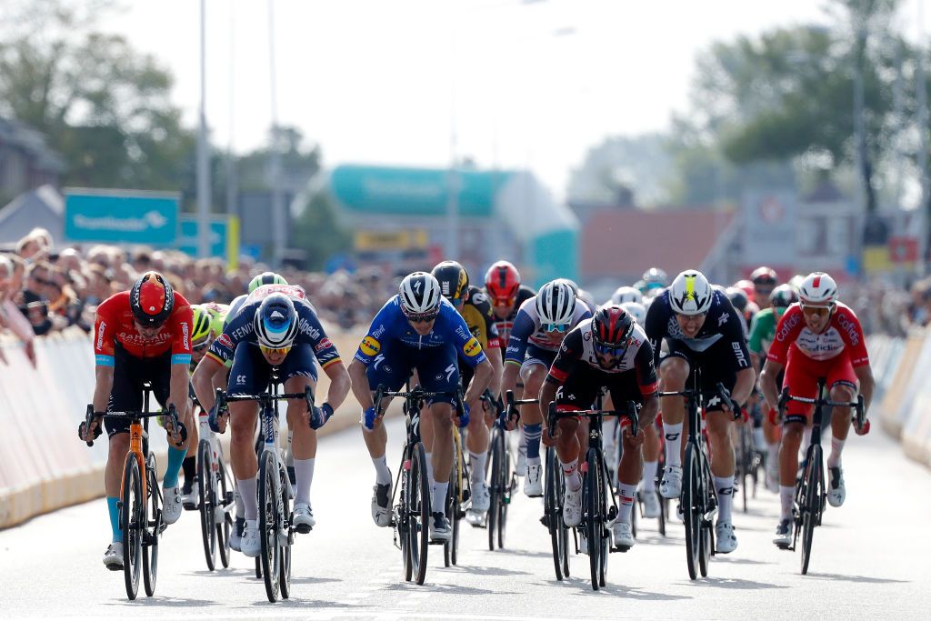 DOKKUM NETHERLANDS AUGUST 30 Tim Merlier of Belgium and Team AlpecinFenix sprint to win ahead of Phil Bauhaus Germany and Team Bahrain Victorious Fernando Gaviria Rendon of Colombia and UAE Team Emirates lvaro Jos Hodeg Chagui of Colombia and Team Deceuninck QuickStep and Max Walscheid of Germany and Team Qhubeka Nexthash during the 17th Benelux Tour 2021 Stage 1 a 1696km stage from Surhuisterveen to Dokkum BeneluxTour on August 30 2021 in Dokkum Netherlands Photo by Bas CzerwinskiGetty Images