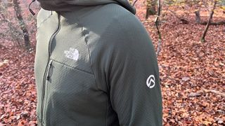 Man wearing The North Face Summit Series Futurefleece jacket in forest