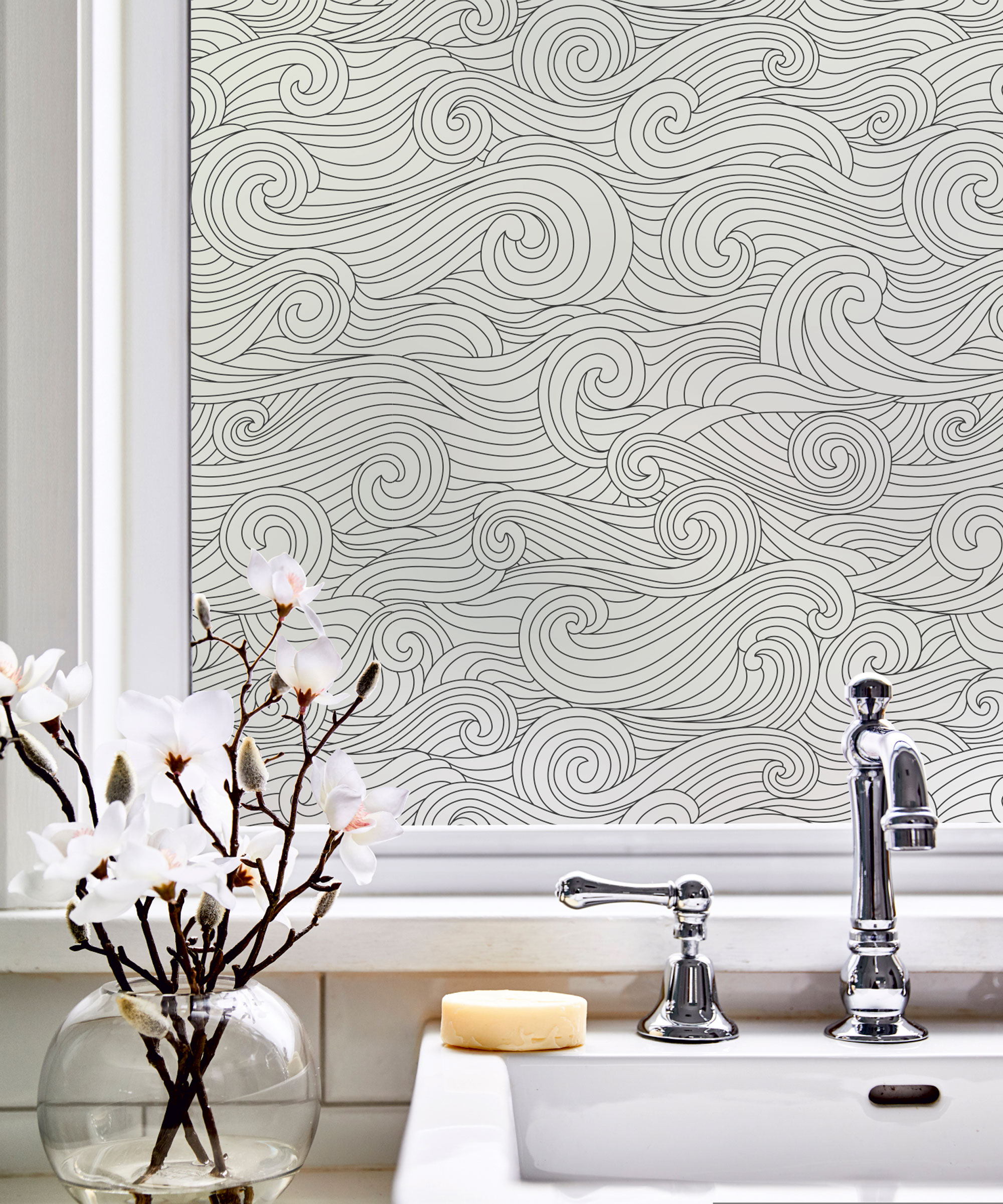 Bathroom window with nautical pattern window film