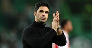 Arsenal manager Mikel Arteta applauds the fans following the UEFA Europa League round of 16 leg one match between Sporting CP and Arsenal FC at Estadio Jose Alvalade on March 09, 2023 in Lisbon, Portugal.