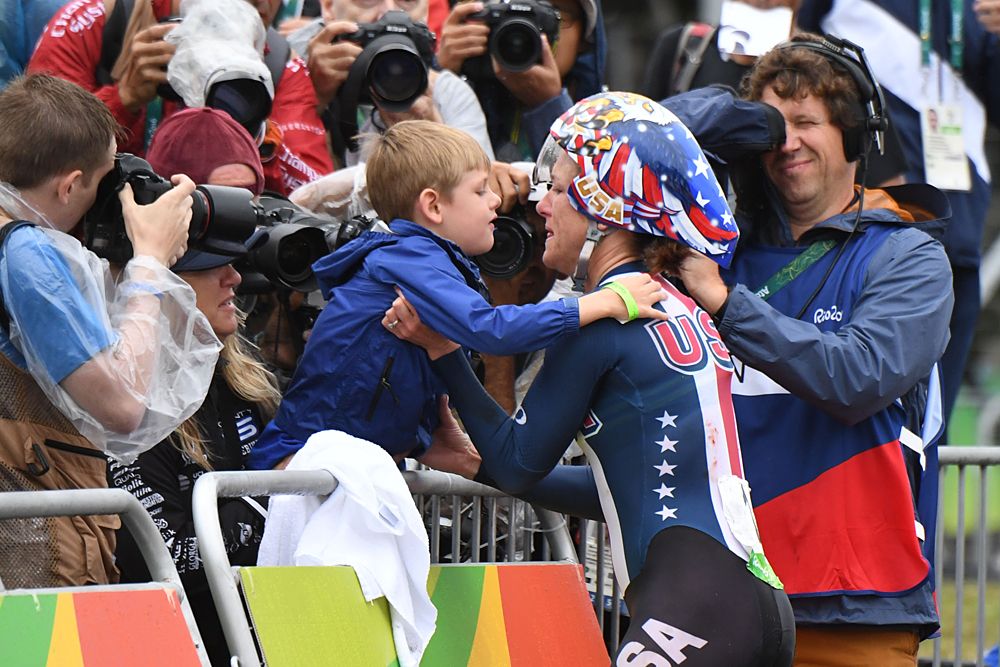 Kristin Armstrong is congratulated by her son Lucas