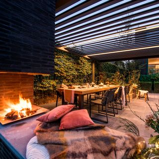 outdoor with fireplace and dinning table with chair