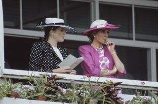 Sarah Ferguson and Princess Diana attend the Derby Day meeting at Epsom Downs Racecourse in 1987