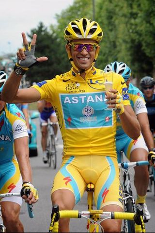 Alberto Contador (Astana) has a few sips of bubbly to celebrate his third Tour victory.