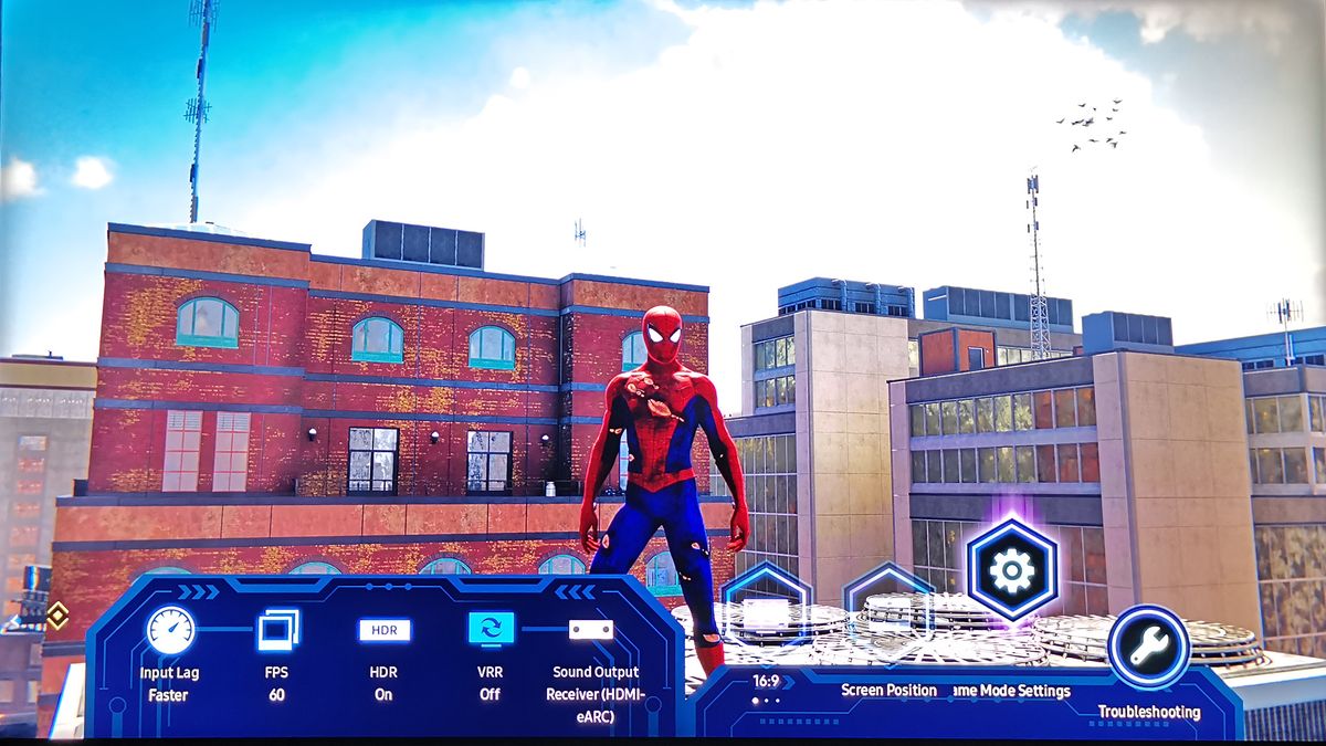 Samsung QN95A gameplay footage of Spider-Man standing on roofrop