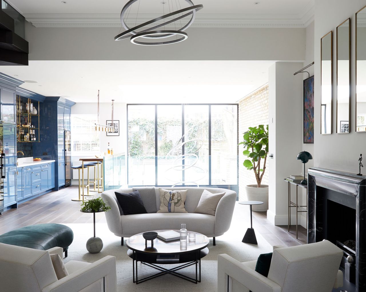 Open plan seating and bar area in Georgian townhouse in London