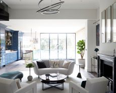 Open plan seating and bar area in Georgian townhouse in London