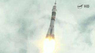 A Soyuz rocket launches into space carrying three new members of the International Space Station's Expedition 32 crew into orbit from Baikonur Cosmodrome, Kazakhstan, on July 15, 2012 local time.