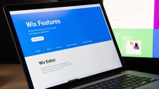 Wix website homepage on laptop