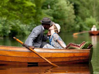 Downton Abbey's Lady Rose and Jack Ross enjoy a romantic kiss while on a boat ride in series 4