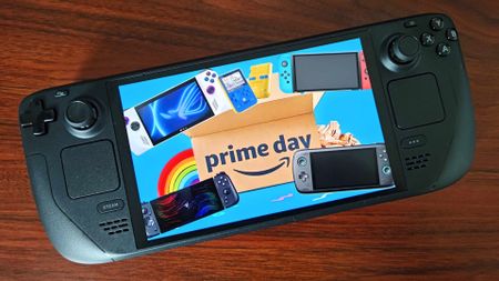 Steam Deck with Nintendo Switch, Razer Edge, Ayn Odin 2, Lenovo Legion Go and Super Pocket on screen with cardboard box in the middle with Prime Day on front