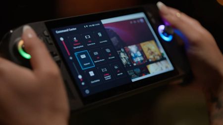 Close up of Asus ROG Xbox Ally X handheld being held in hands with settings menu open.