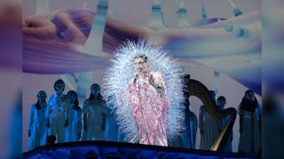 Björk performing with a spiky costume