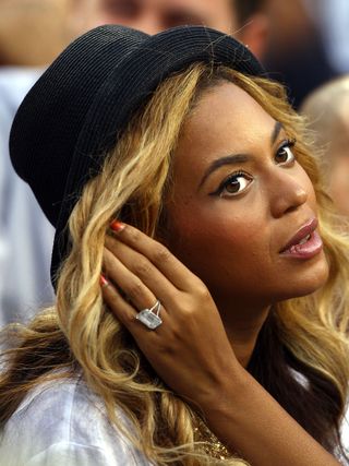 Recording artist Beyonce watches Rafael Nadal of Spain and Novak Djokovic of Serbia play during the Men's Final on Day Fifteen of the 2011 US Open at the USTA Billie Jean King National Tennis Center on September 12, 2011 in the Flushing neighborhood of the Queens borough of New York City.