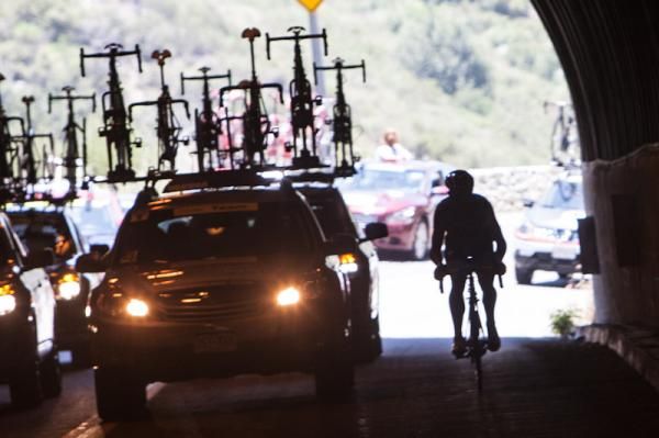 A rider enters a tunnel along the course
