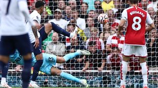 Cristian Romero deflects a Bukayo Saka shot into his own net in the north London derby between Arsenal and Tottenham at the Emirates Stadium in September 2023.