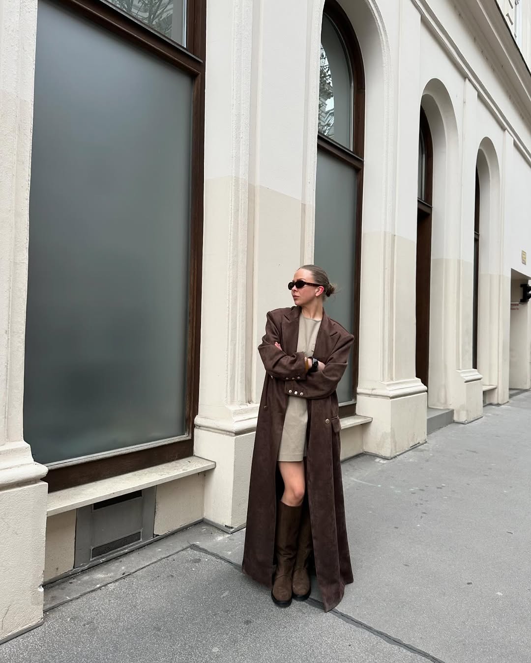 woman wearing knee high brown suede boot trend