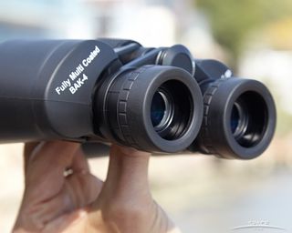 Rubber eyeguards on Celestron's SkyMaster 8x56s twist up and down easily to keep stray light sources from spoiling your star-hopping.