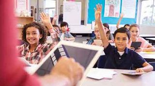 St. Vrain Valley School District elementary students with iPads, ready to participate.  