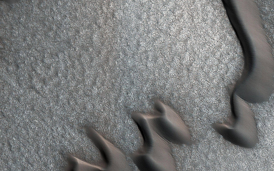 Sand dunes and boulders on Mars