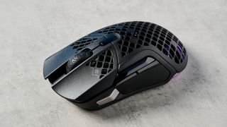 Photograph of the SteelSeries Aerox 5 wireless gaming mouse with honeycomb design