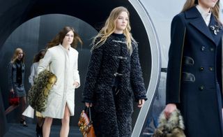 Female models on the runway of Louis Vuitton A/W 2015 fashion show