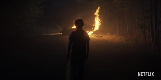 stranger things season 4 teaser screenshot burning car figure