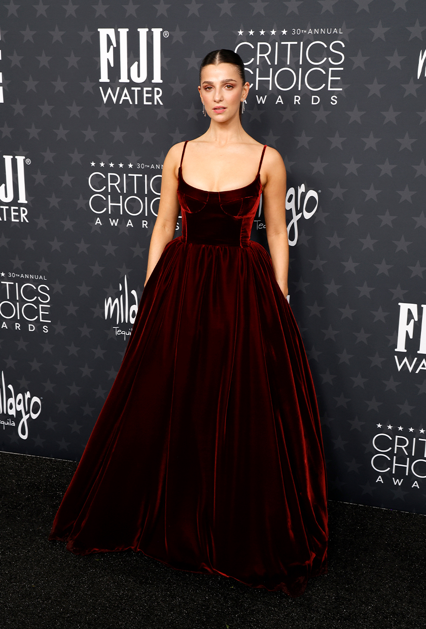 Marisa Abela wears a burgundy dress to the Critics Choice Awards.