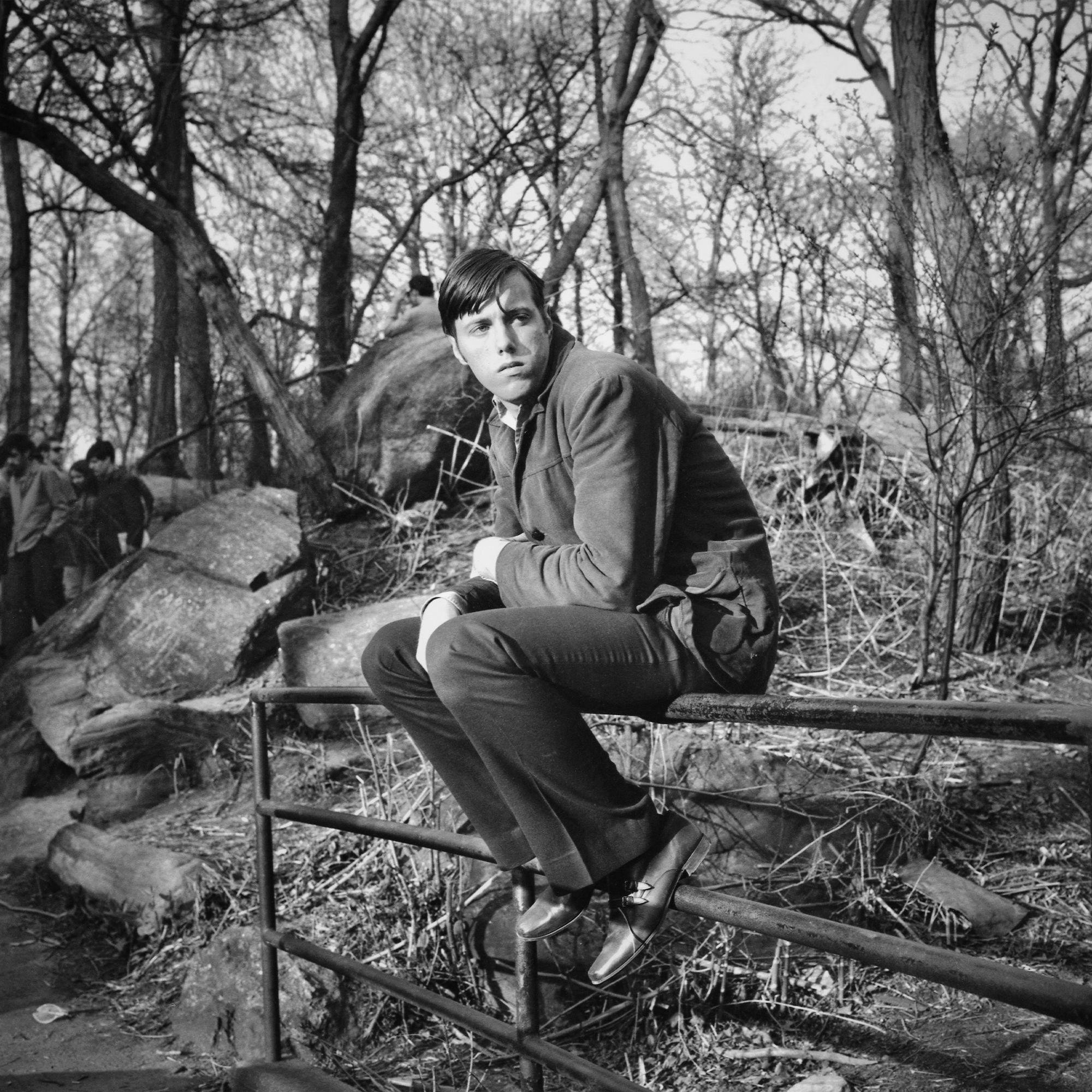 black and white photograph of man in park