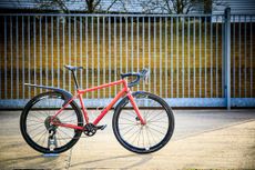 Image shows a person riding their first gravel bike.