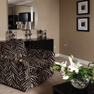 living room with bold zebra print armchair