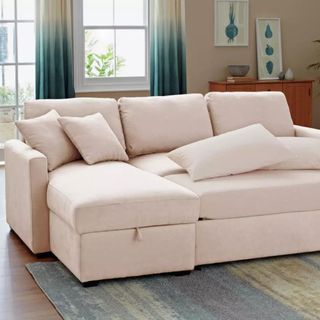 Blush pink sofa bed 