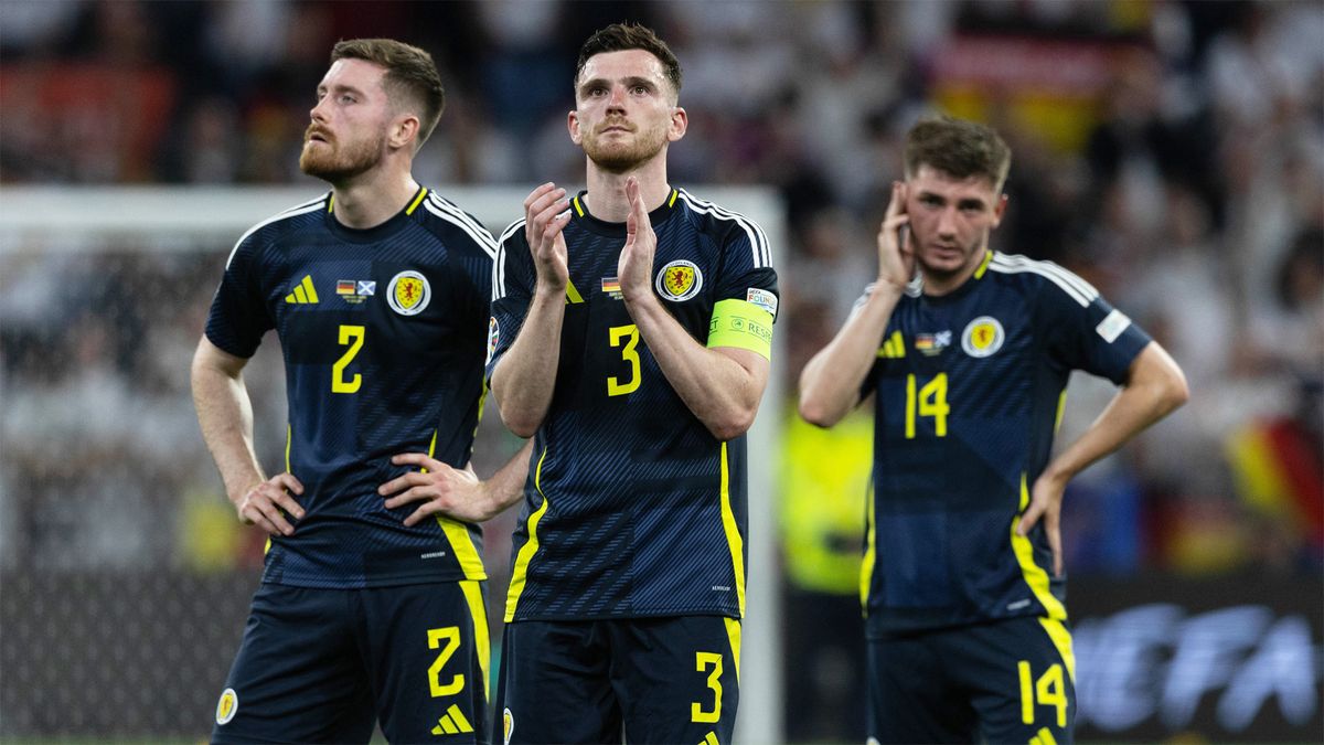 Scotland&#039;s Anthony Ralston, Andy Robertson and Billy Gilmour applaud the fans after Euro 2024 defeat to Germany. 