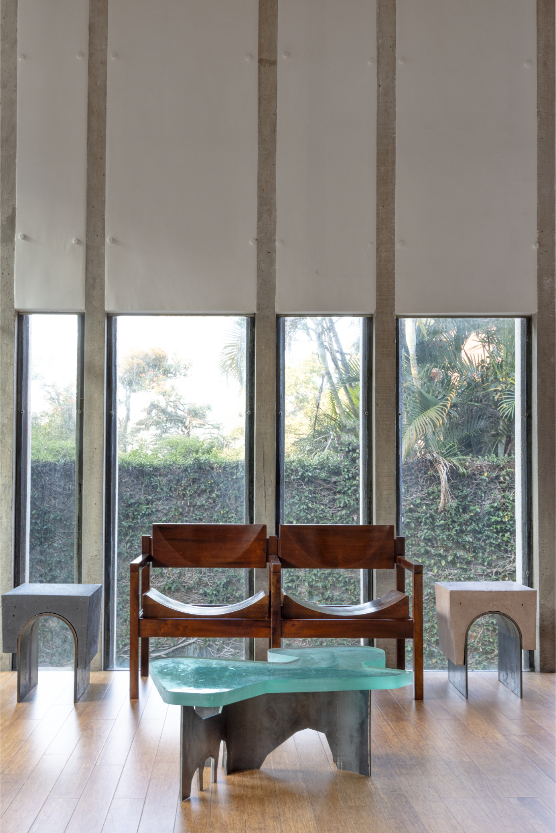 Modernist Brazilian furniture in brutalist house interior