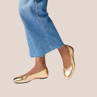 woman wearing gold ballet flats and jeans